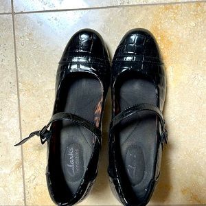 Clarks mary janes. Black textured patent leather. Very comfortable